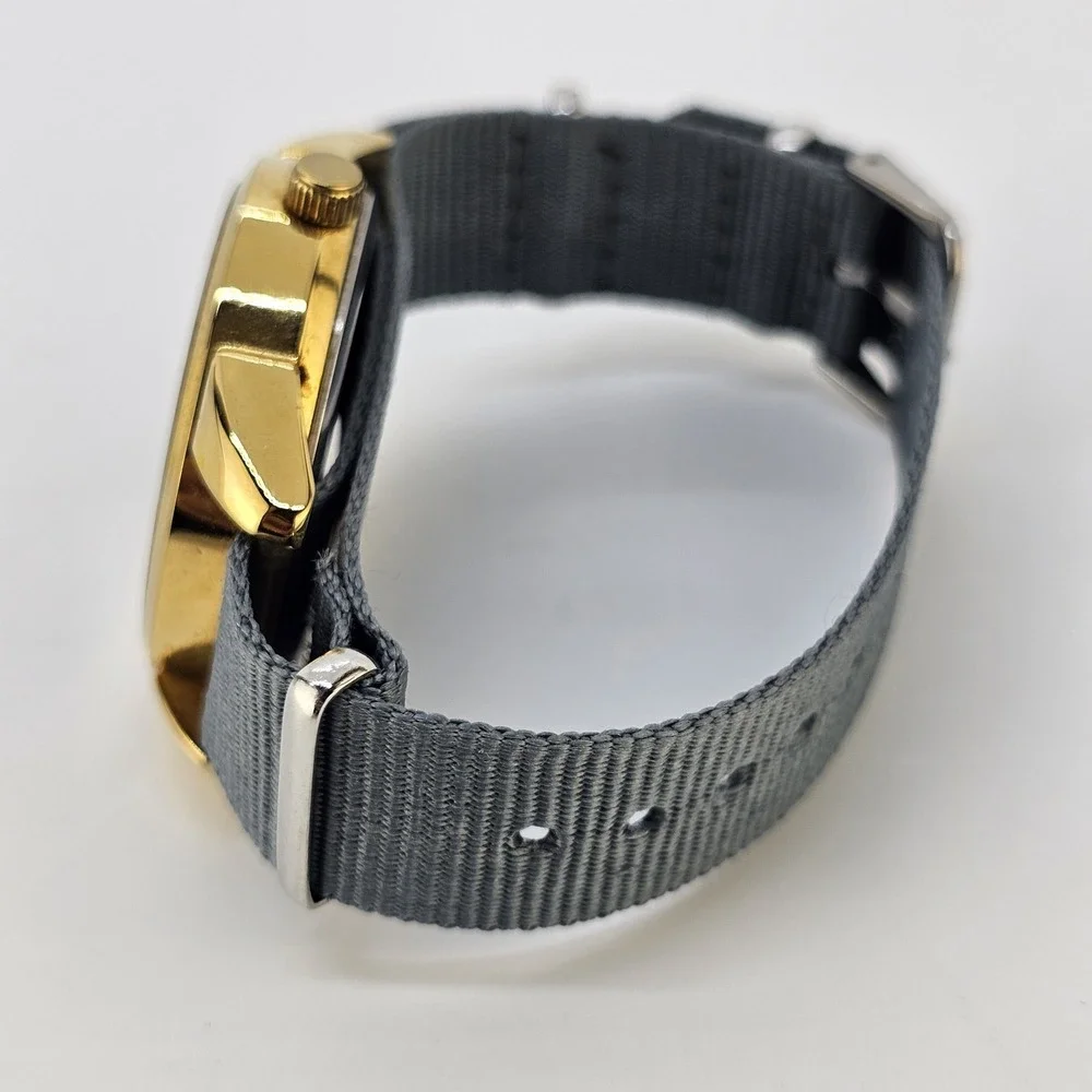 Men's Analog Watch 38MM Black Dial Day Date NEW Gray Canvas Band NEW Battery